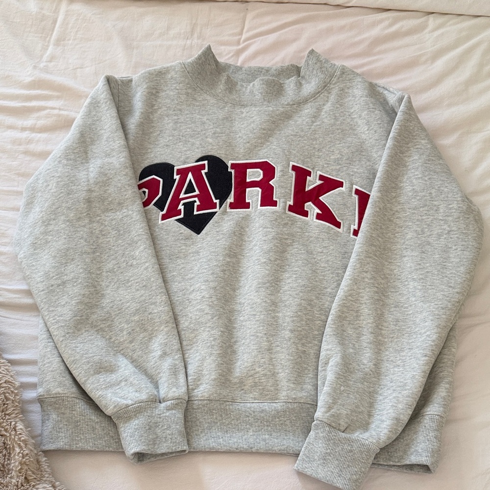 Heather Gray Crewneck Sweatshirt with Red Appliqué